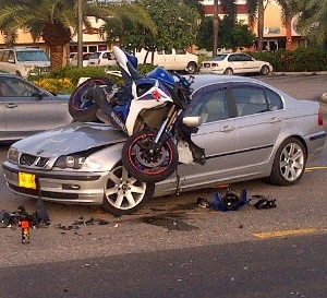 Motorcyclist survives major collision in GT