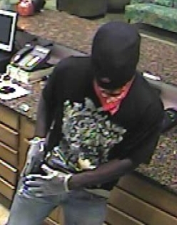 Cops release pictures of hotel robber