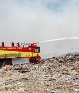 Fire crews still dousing smouldering dump