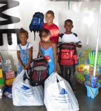 Radio Cayman & LIME get kids packed for school
