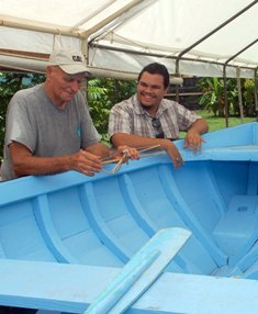 Young boat builder documents local catboat plans