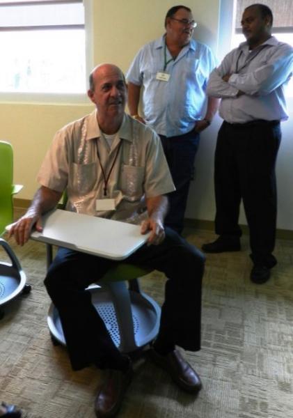 Mr. Eden trys out a Pod Chair.jpg