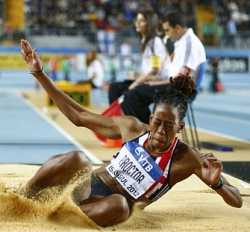 Proctor leaps into Olympic team with record jump