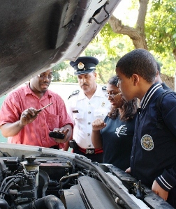 Cops donate old cars to student auto-mechanics