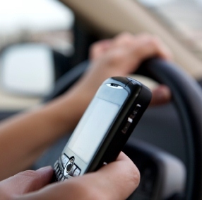 Rules spelt out on cell phone use behind wheel