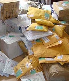 Post office to charge for holding packages
