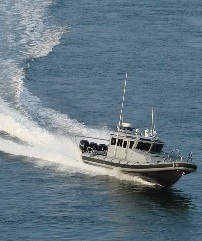 Boat struck reef, 7 on board