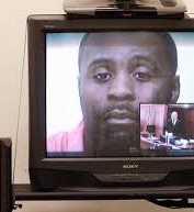 Prison-court video link has mixed results