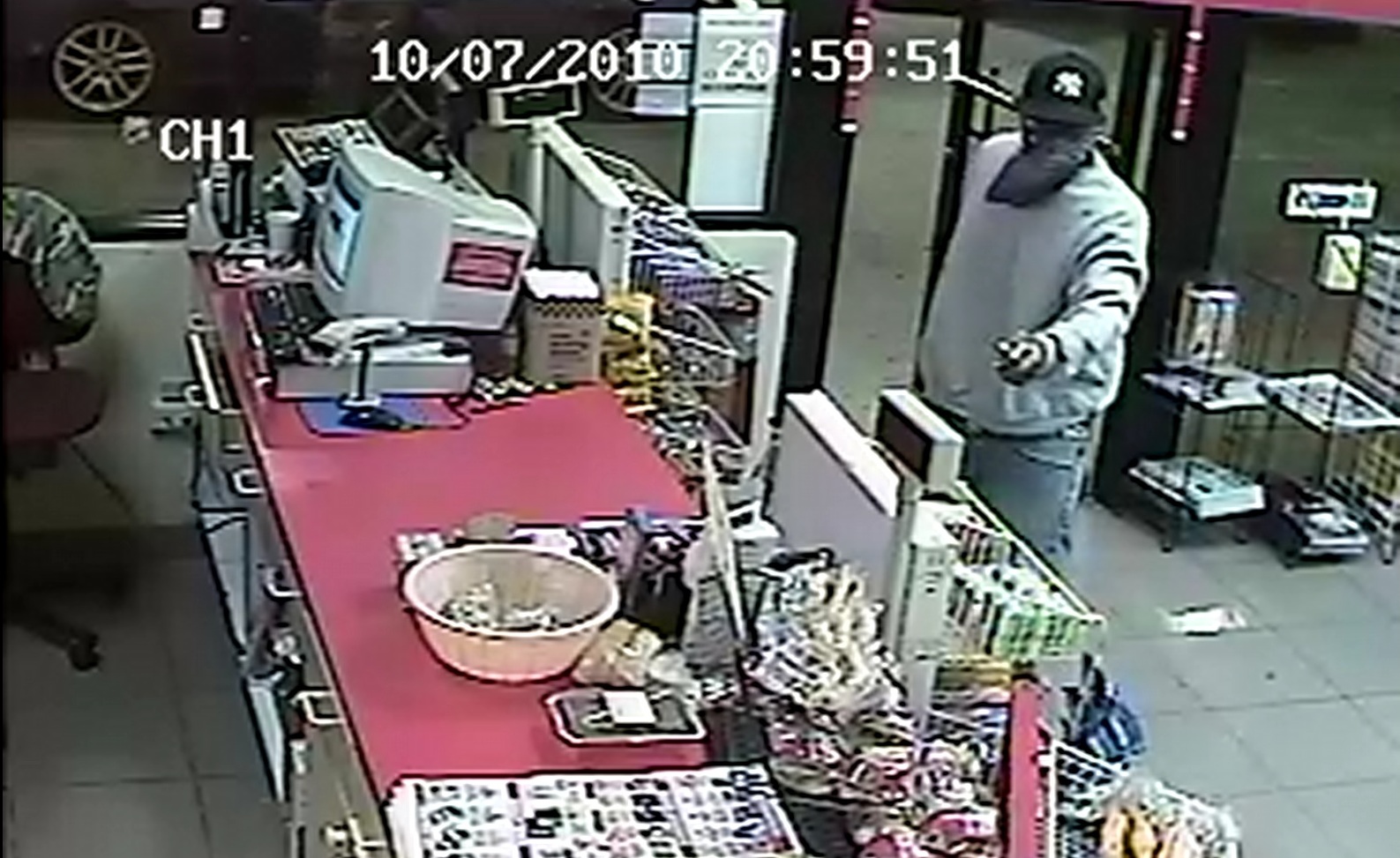 Police release CCTV of gas station stick-up