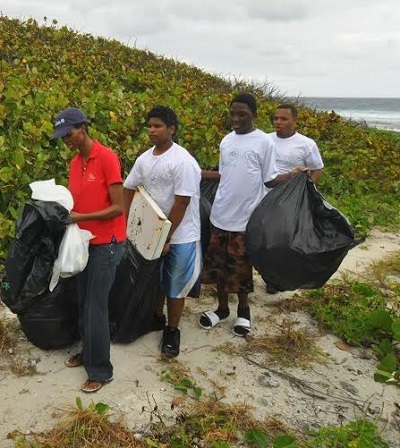 School students clean up East End beach