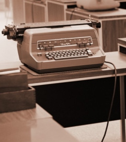 h-armstrong-roberts-typing-pool-workstation-desk-chair-electric-typewriter-and-telephone.jpg